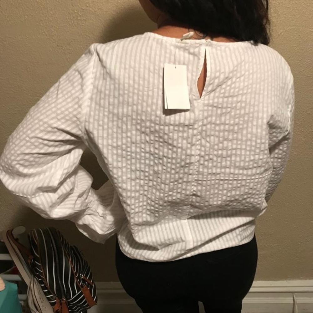 White bell sleeved blouse